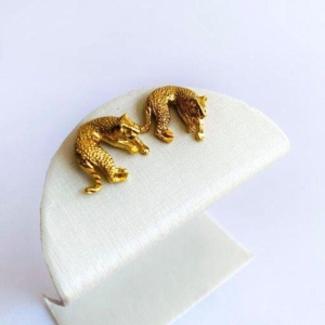 Brinco Onça Deitada