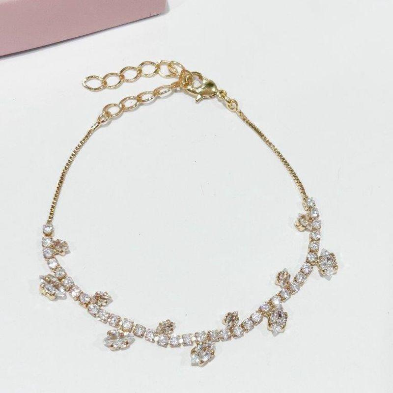 Pulseira Riviera Cristal com Pétalas Ouro